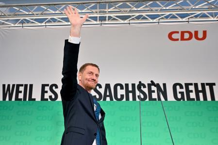 Saxony state premier and Germany's Christian Democratic Union (CDU) party top candidate Michael Kretschmer reacts after first exit polls in the Saxony state election, in Dresden, Germany, September 1, 2024.