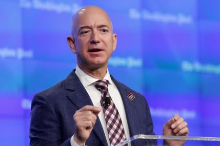WASHINGTON, DC - JANUARY 28: Amazon founder and Washington Post owner Jeff Bezos delivers remarks during the opening ceremony of the media company's new location January 28, 2016 in Washington, DC. Bezos purchased the newspaper and media company in October of 2013 from the storied Graham family. (Photo by Chip Somodevilla/Getty Images)