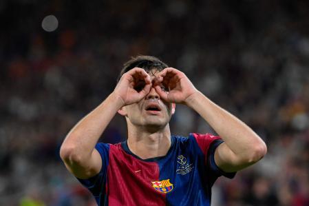 Barcelona's Spanish midfielder #08 Pedri celebrates scoring the opening goal during their Spanish Cup, Copa del Rey (King's Cup) final football match between FC Barcelona and Real Madrid CF at La Cartuja stadium in Seville on April 26, 2025. (Photo by Josep LAGO / AFP)