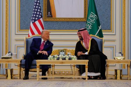 U.S. President Donald Trump and Saudi Crown Prince Mohammed Bin Salman speak as they meet in Riyadh, Saudi Arabia, May 13, 2025. REUTERS/Brian Snyder