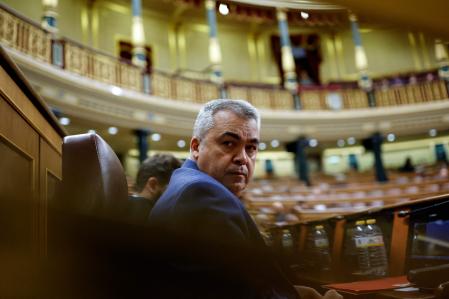 (FILES) Organization Secretary of the Spanish Socialist Party PSOE Santos Cerdan attends a plenary session at the Spanish lower house, Congress of Deputies, in Madrid on November 21, 2024. A top official in Spain's ruling Socialist Party was implicated on June 12, 2025 in a widening corruption investigation that has already ensnared a former close aide to Prime Minister Pedro Sanchez. Santos Cerdan, the party's organisation secretary and its third-ranking figure, is suspected of being an accomplice in the alleged improper awarding of a public contract during the Covid-19 pandemic, according to a newly published judicial report. (Photo by OSCAR DEL POZO / AFP)