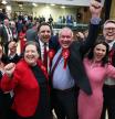 HAMILTON, SCOTLAND - JUNE 06: Davy Wilson, Scottish Labour candidate, celebrates with Anas Sarwar and Jackie Ballie and Monica Lennon (L) after winning the Hamilton, Larkhall and Stonehouse by-election on June 06, 2025 at South Lanarkshire Council Headquarters in Hamilton, Scotland. The Scottish parliamentary constituency of Hamilton, Larkhall and Stonehouse is holding a by-election, following the death of MSP Christina McKelvie in March. (Photo by Jeff J Mitchell/Getty Images)