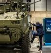 A VCR 8X8 Dragon armored fighting vehicle at the Indra Group stand during the FEINDEF defense exhibition in Madrid, Spain, on Monday, May 12, 2025. Prime Minister Pedro Sanchez promised last month that the country will invest #{emoji}128;23 billion ($26 billion) in defense this year and meet NATO#{emoji}146;s goal of 2% of GDP. Photographer: Angel Garcia/Bloomberg