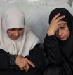 Mourners react at the funeral of Palestinians killed in an overnight Israeli air strike on an UNRWA school sheltering displaced people, according to Gazaâ#{emoji}128;#{emoji}153;s health ministry, at Al-Ahli Arab Hospital in Gaza City, July 5, 2025. REUTERS/Dawoud Abu Alkas