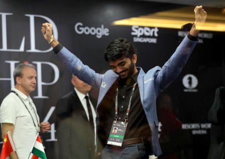 Singapore (Singapore), 12/12/2024.- Chess grandmaster Gukesh Dommaraju of India celebrates after winning Game 14 against Ding Liren (not pictured) of China at the FIDE World Chess Championship in Singapore, 12 December 2024. Gukesh Dommaraju became the youngest ever Chess World Champion by beating Ding Liren in the best-of-14-games championships. (Singapur, Singapur) EFE/EPA/HOW HWEE YOUNG