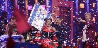 Netta from Israel celebrates after winning the Eurovision Song Contest grand final in Lisbon, Portugal, Saturday, May 12, 2018. (AP Photo/Armando Franca)