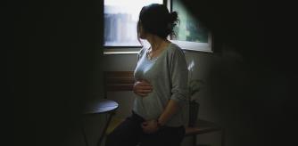 Nino (not her real name) is five months pregnant in Tbilisi in Georgia on 2 November 2023. For her third pregnancy, she is carrying the child of another couple. In Georgia, surrogacy has been legal since 1998 for infertile heterosexual couples, but the practice is now booming, particularly with the war in Ukraine, which has led to a significant number of requests being transferred to Georgia. (Photo by Marie Audinet / Hans Lucas via AFP)