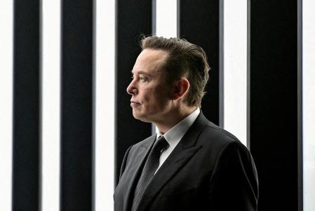 FILE PHOTO: FILE PHOTO: Elon Musk attends the opening ceremony of the new Tesla Gigafactory for electric cars in Gruenheide, Germany, March 22, 2022. Patrick Pleul/Pool via REUTERS//File Photo/File Photo