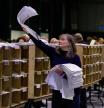 An electoral worker sorts ballot papers, during Ireland's general election, at the Royal Dublin Society (RDS) count centre, in Dublin, Ireland, November 30, 2024. REUTERS/Clodagh Kilcoyne