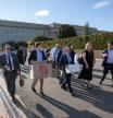 Members of the Pentagon press corp carry their belongings out of the Pentagon after turning in their press credentials, Wednesday, Oct. 15, 2025 in Washington. (AP Photo/Kevin Wolf)
