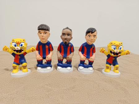 El FC Barcelona ha ampliado su plantilla de 'caganers' con Pau Cubarsí, Raphinha y Pedri.