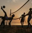 Men play footvolley on the Ramlet al-Baida public beach in Beirut, Lebanon, Thursday, Aug. 14, 2025, on a sweltering hot day. (AP Photo/Bilal Hussein)