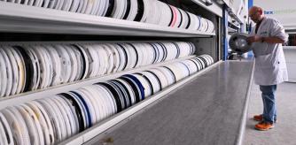 21 October 2025, Thuringia, Arnstadt: An employee in circuit board production at the Arnstadt plant of Hitachi Rail GTS Deutschland GmbH. The company employs over 2,000 people at three locations in Germany, who manufacture signaling equipment and systems for rail transport. In Arnstadt, Hitachi Rail currently has 660 employees and a total of 50 trainees in the fields of electronics for devices and systems, industrial electrics and mechatronics. Photo: Martin Schutt/dpa (Photo by Martin Schutt/picture alliance via Getty Images)