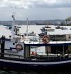Varios barcos de flota artesanal tras la convocatoria de paro por parte de la Federación Galega de Cofradías de Pescadores en la dársena de A Marina en A Coruña, Galicia (España), a 26 de marzo de 2021. El objetivo del paro es mostrar rechazo ante el nuevo reglamento de control de la pesca de la Unión Europea (UE). Este reglamento establece la obligación de que las embarcaciones de más de cuatro metros deban estar geolocalizadas, se instalen cámaras a bordo y se mantenga un diario electrónico.